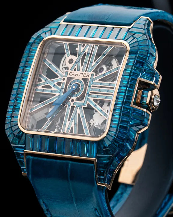 Reloj Cartier Skeleton Oro Rosa 18k con Zafiros Azules Baguette